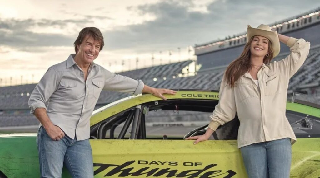 Tom Cruise e Anne Hathaway em imagem promocional. Imagem: Reprodução