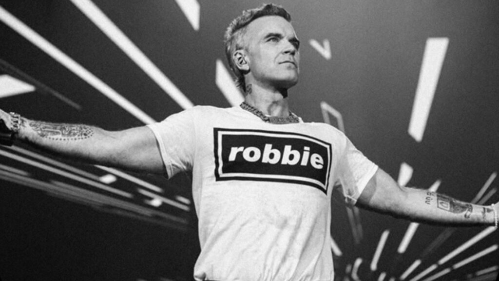 Robbie Williams em imagem promocional. Foto: Divulgação