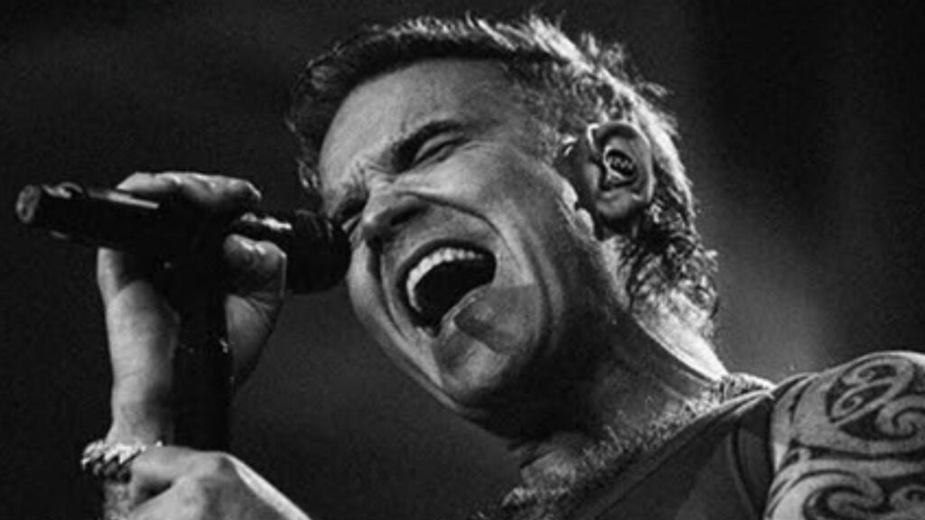 Robbie Williams em imagem promocional. Foto: Divulgação